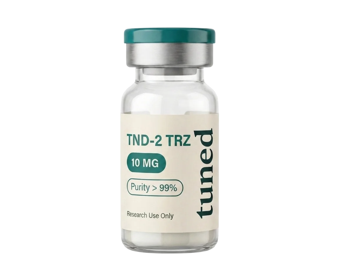 Clear glass vial with a teal cap, silver collar and cream label